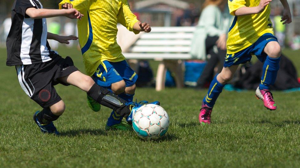 Children playing football