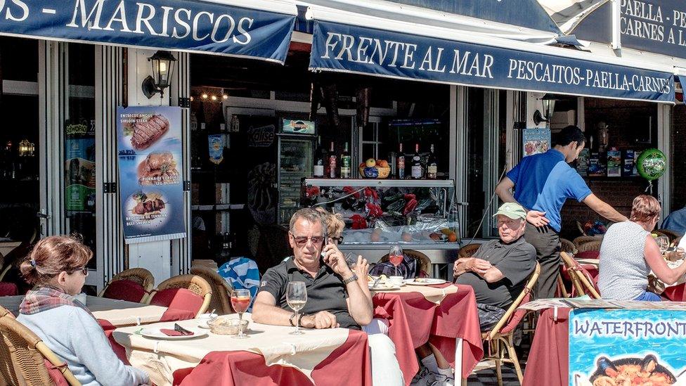 Expats and tourists at restaurant in Benalmadena, Spain, 17 Mar 16