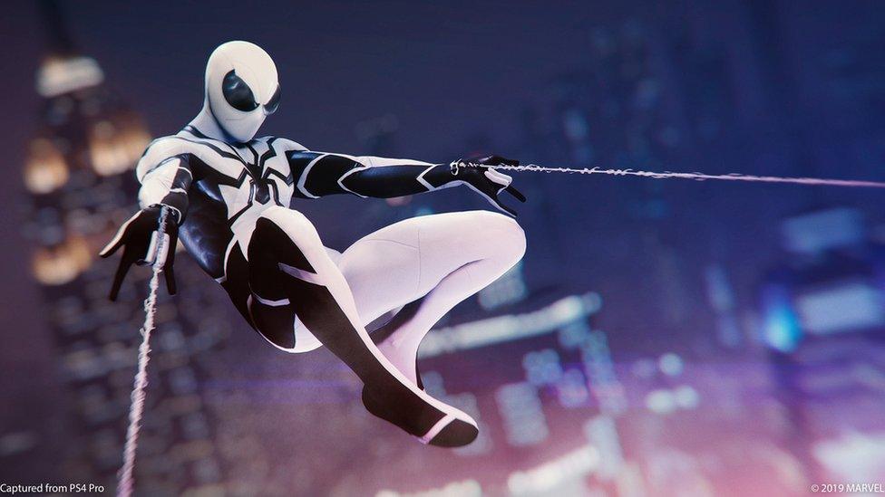 Spider-Man wearing the black and white Future Foundation suit