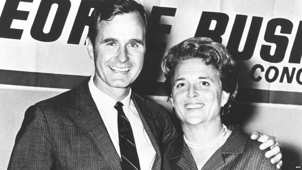 George HW Bush poses with his wife Barbara during his campaign for Congress in the 1960s.