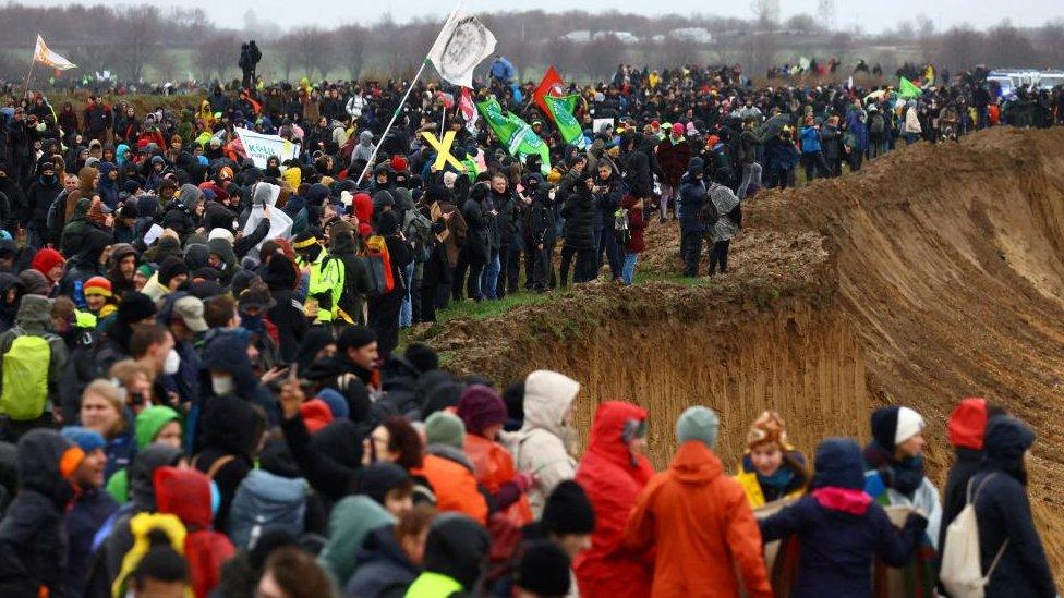 Activists demonstrate during a protest against the expansion of Garzweiler open-cast lignite mine