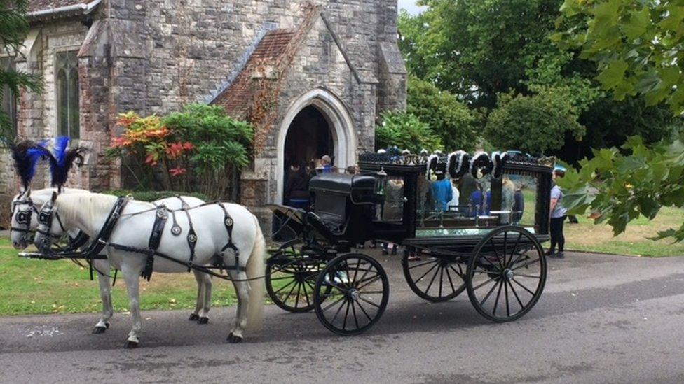 Hearse arriving