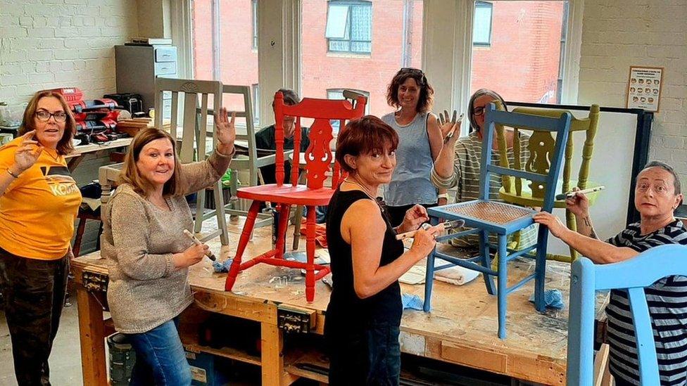 People taking part in a NuLife upcycling workshop