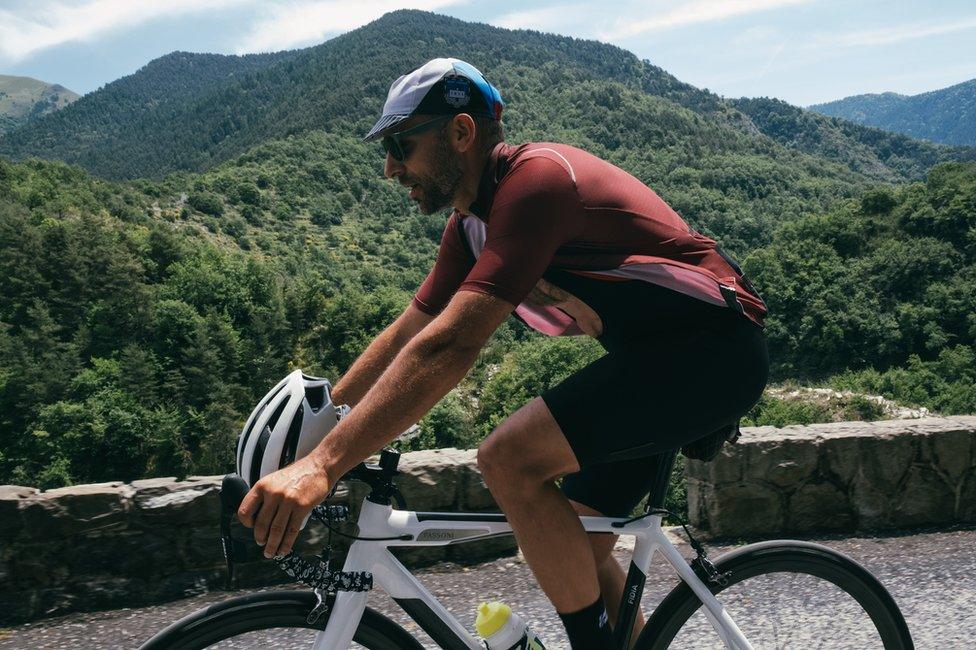 Remi Clermont cycling in the hills above Nice