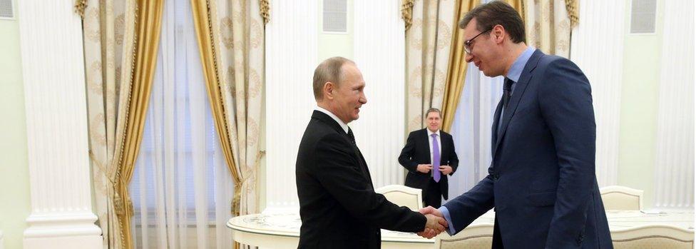 President Vladimir Putin (L) shakes hands with Serbian Prime Minister Aleksandar Vucic (R) during their meeting at the Kremlin on March 27, 2017 in Moscow