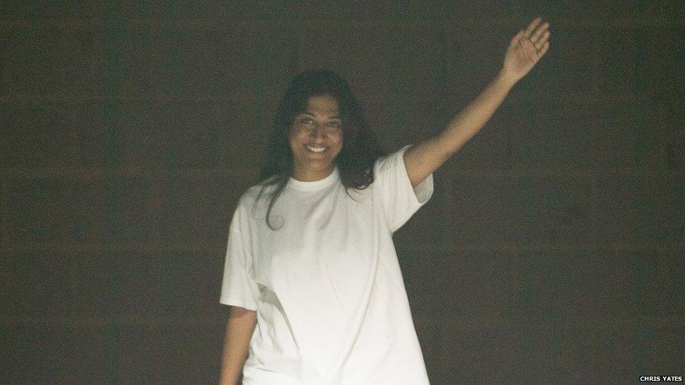 Supriya waves to the audience after her show