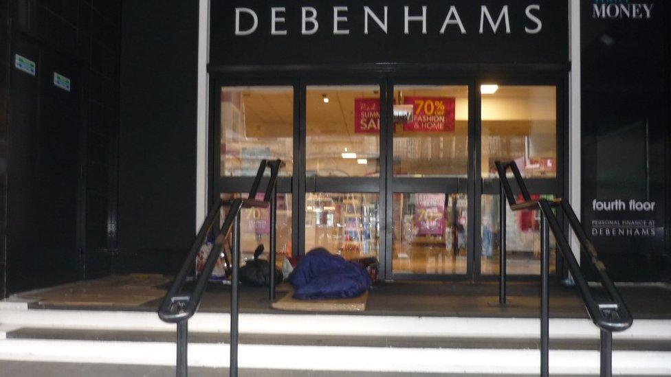 Homeless people sleeping in the doorway of Debenhams in Norwich