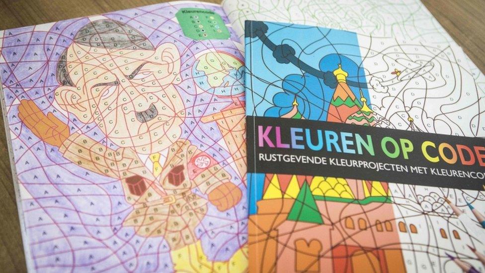 A photo shows a colouring book with an image of Adolf Hitler bought at the Dutch store Kruidvat by Ray Vervloed in Pijnacker, the Netherlands, on April 5, 2017