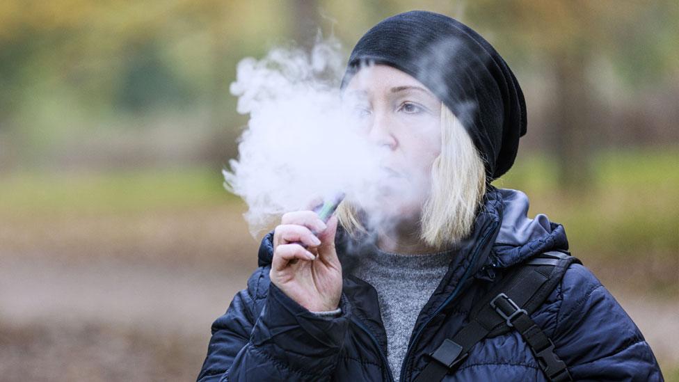 A woman vaping