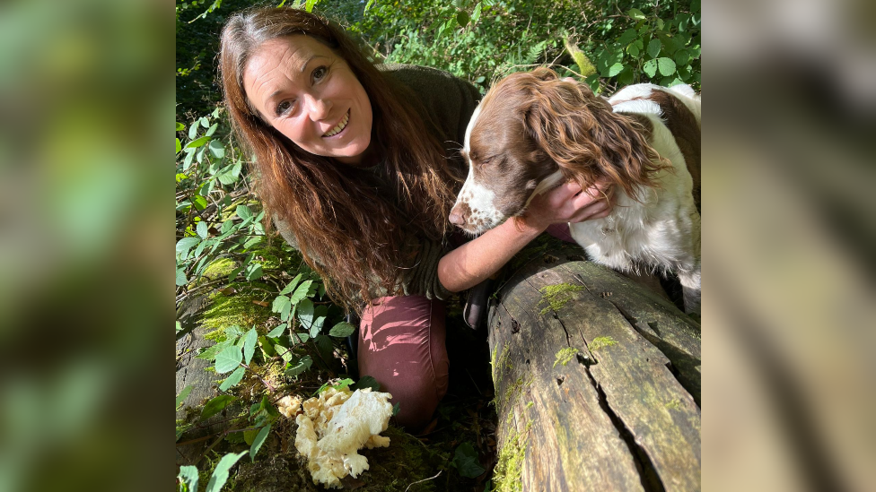 Chloe Newcomb Hodgetts with the mushroom she found