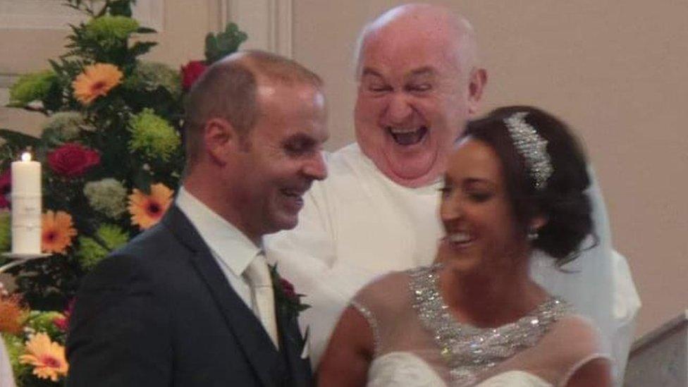 Fr Kearns having a laugh at Emma Thornton's wedding in 2015