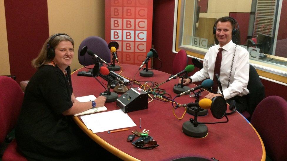 Health secretary Jeremy Hunt with Sally Marlow from King's College London