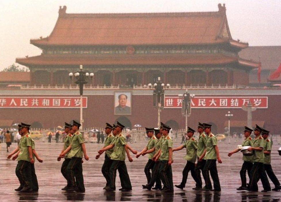 Chinese military police march across Beijings Tiananmen Square Tuesday June 2, 1998