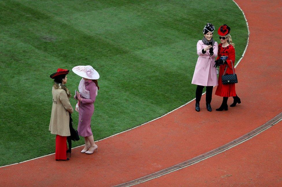 Racegoers during Ladies Day of the 2019 Cheltenham Festival at Cheltenham Racecourse