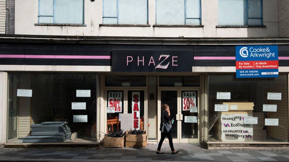 Shops boarded up on Taff Street