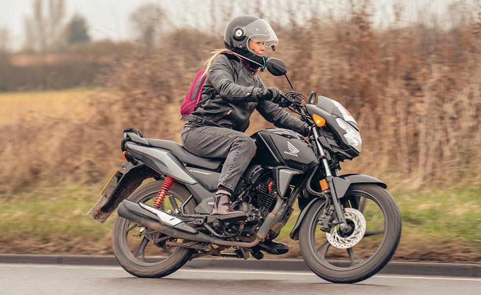 Karina Artun on a motorbike