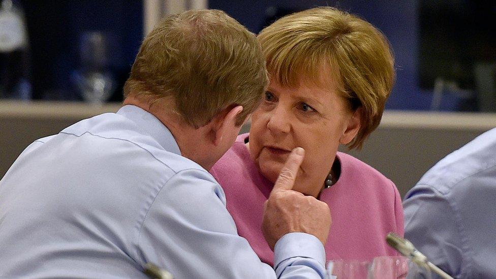 Irish Prime Minister Enda Kenny and German Chancellor Angela Merkel at EU summit in Brussels (19 Feb)