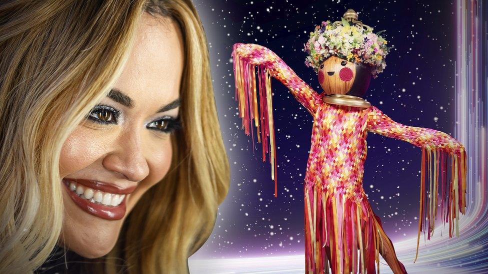 composite image shows rita ora smiling next to an image of maypole from the masked singer