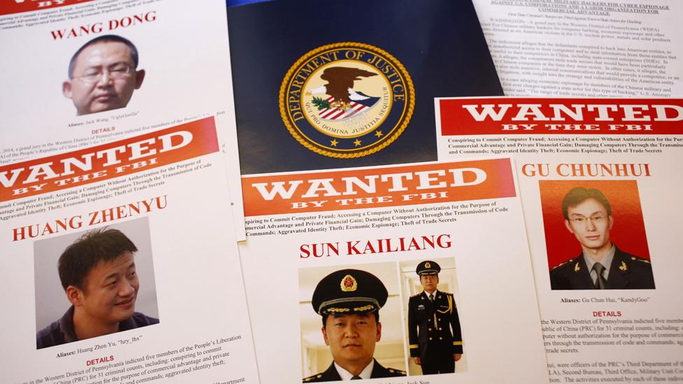 FBI (Federal Bureau of Investigation) press materials are displayed on a table of the Justice Department in Washington, Monday, May 19, 2014. A U.S. grand jury has charged five Chinese hackers with economic espionage and trade secret theft, the first-of-its-kind criminal charges against Chinese military officials in an international cyber-espionage case.