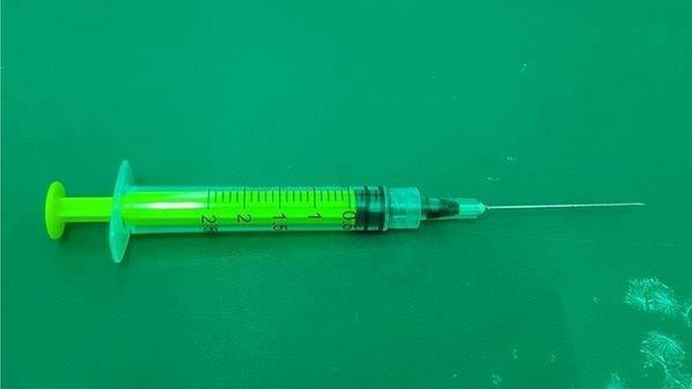 Syringe with needle