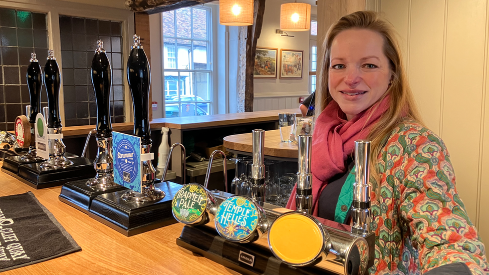 Owner Leonora Faggionato behind the bar