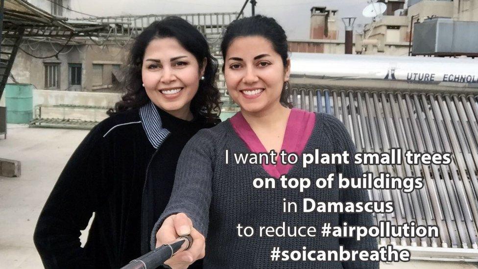 Areej and Hala in Damascus with the phrase "I want to plant small trees on top of buildings in Damascus to reduce #AirPollution #SoICanBreathe"