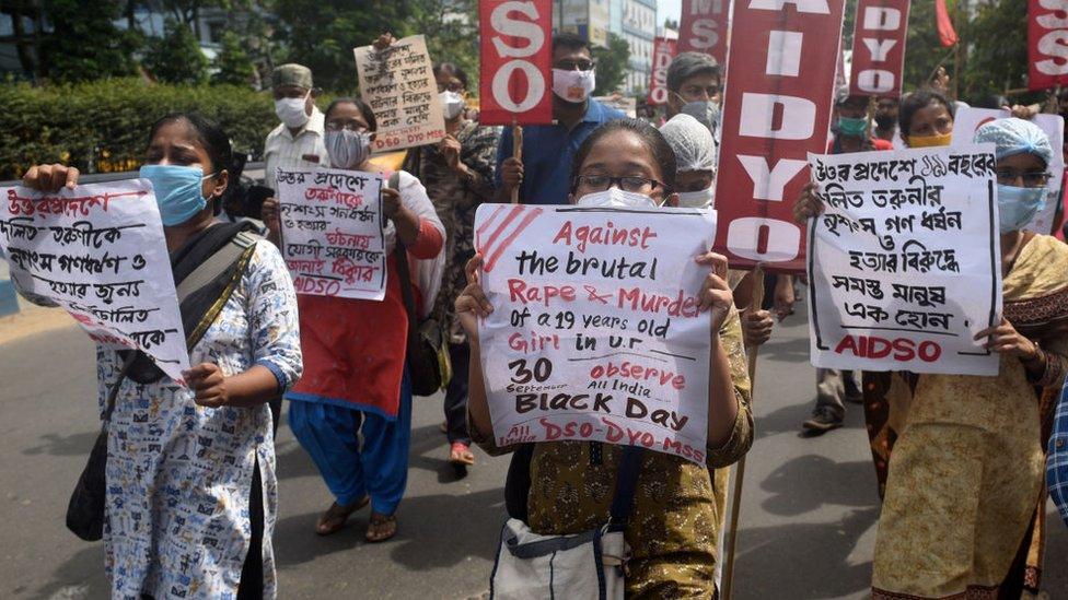 Members of All India Democratic Students Organisation (AIDSO) stage a protest rally against the Hathras gangrape incident