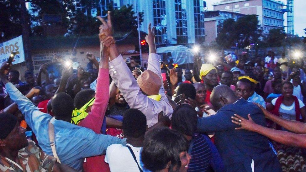 Supporters and ex-prisoners celebrating.