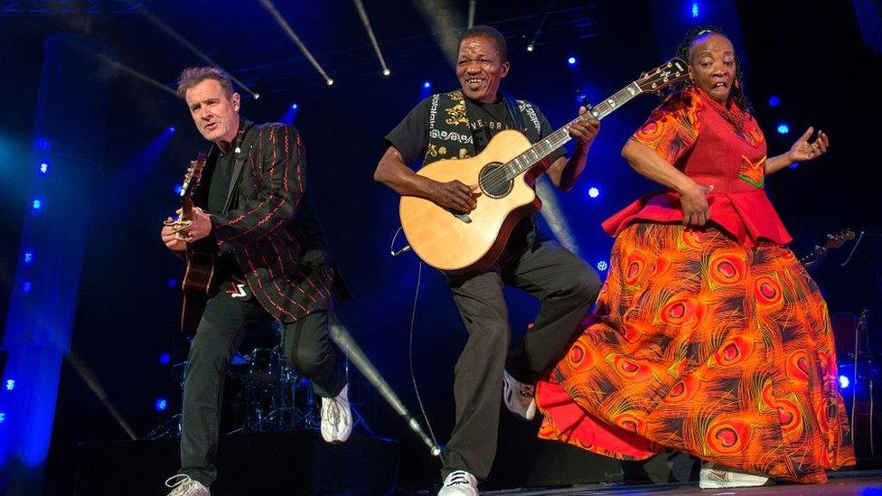 Johnny Clegg (L) in June 2017 in Cape Town during his final world tour, with guitarist Sipho Mchunu (C)