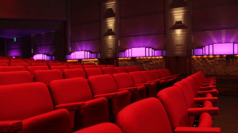 Empty view of rows of red seats inside the BBC Radio Theatre in Broadcasting House