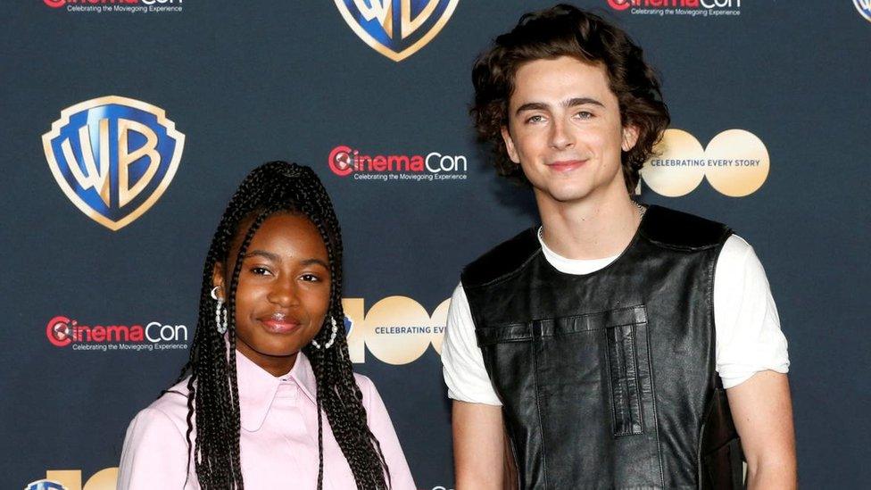 Calah Lane (L) and Timothee Chalamet, promoting the movie Wonka, attend a Warner Bros presentation during CinemaCon, the official convention of the National Association of Theatre Owners, in Las Vegas, Nevada