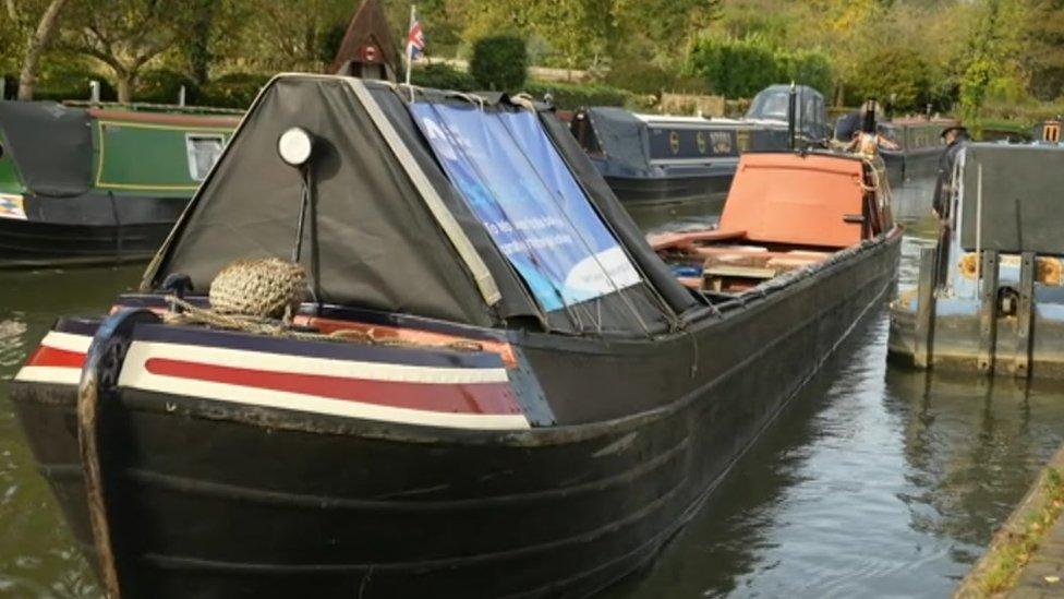 The canal boat Sculptor in Stoke Bruerne, Northamptonshire