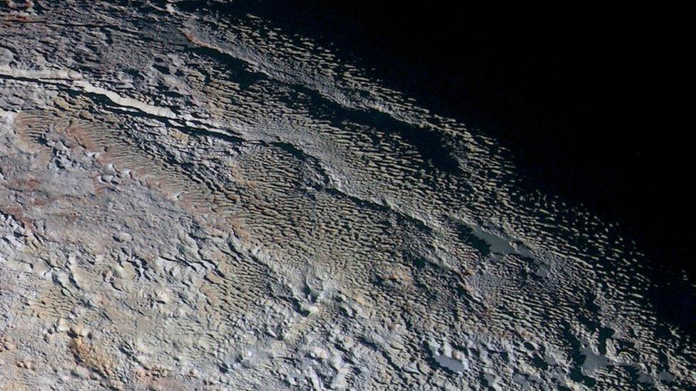 Pluto - snakeskin terrain