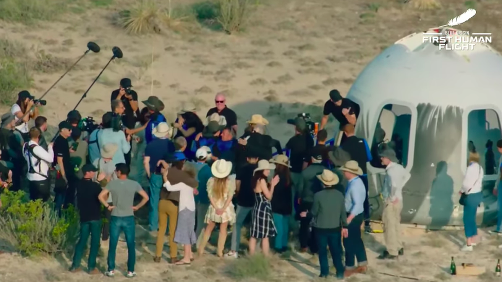 Crowd around New Shepard capsule