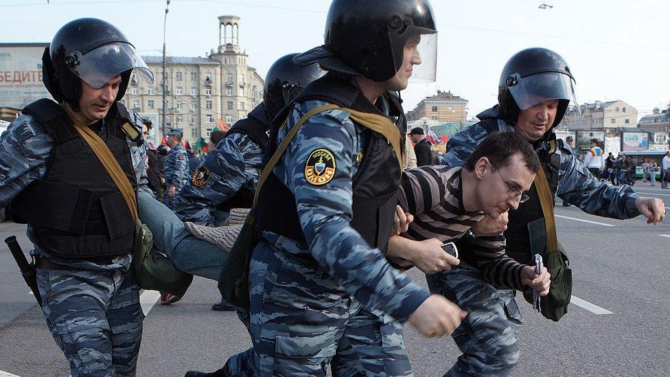 A protester is arrested in Moscow, Russia on May 6, 2012