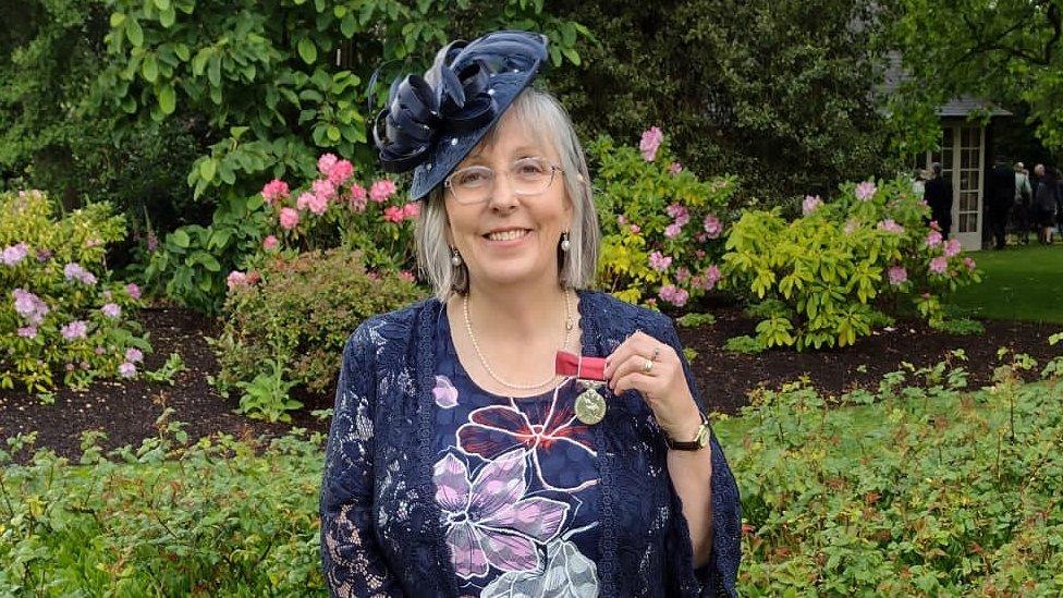 Nurse Ann Baker with her British Empire Medal