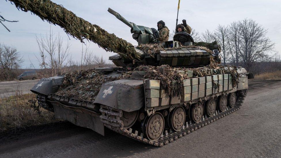 Ukrainian forces driving a tank