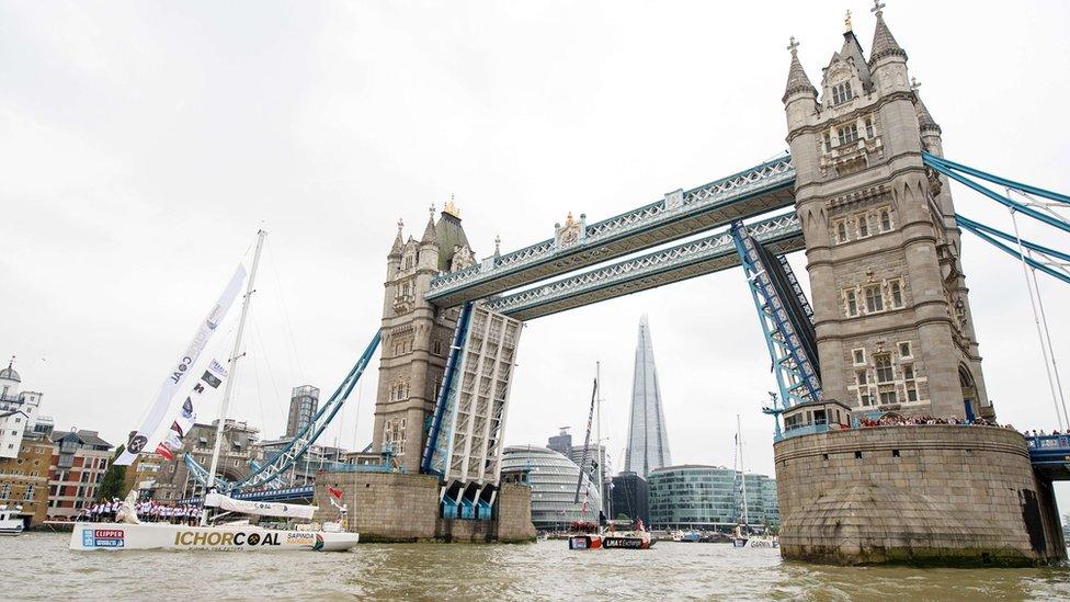 The IchorCoal clipper passes under Tower bridge in central London