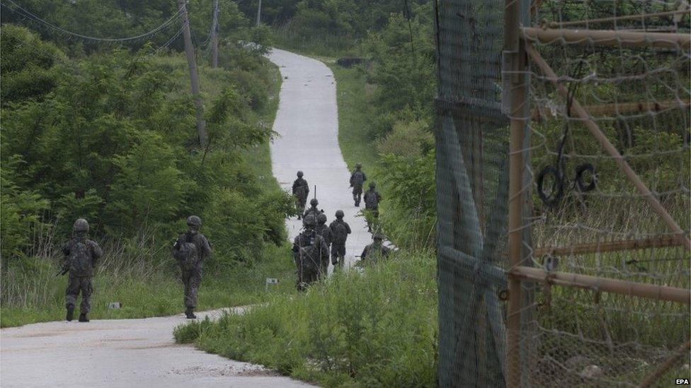 South Korean soldiers patrol the demilitarized zone (June 2016)