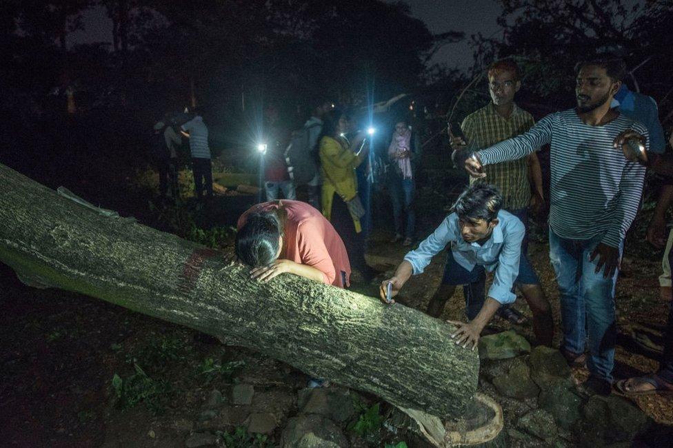 Protesters cry over felled trees in Aarey colony on October 5, 2019 in Mumbai, India.