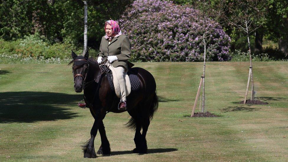 The Queen has been photographed riding in the grounds of Windsor Castle - the first time she has been seen outside since the coronavirus lockdown began.