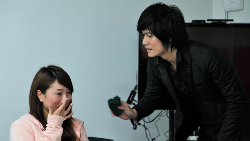 Ryusei and a weeping woman