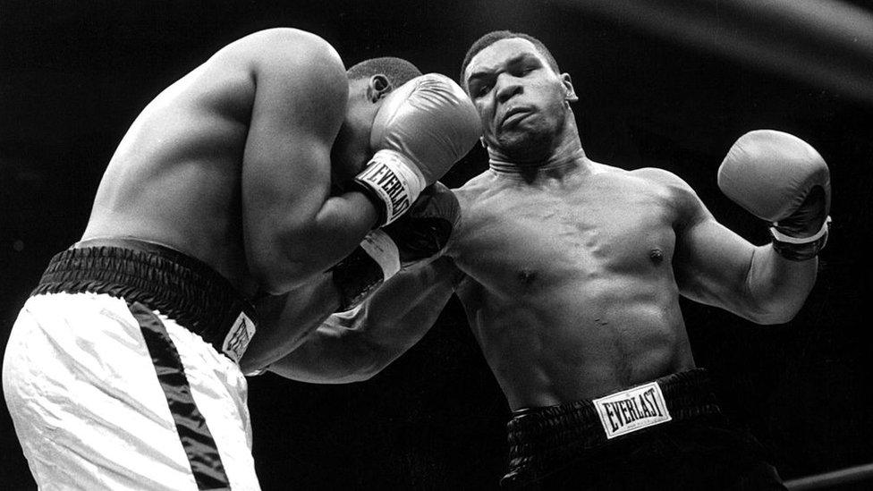 Mike Tyson (right) boxed at Gleason's as a child