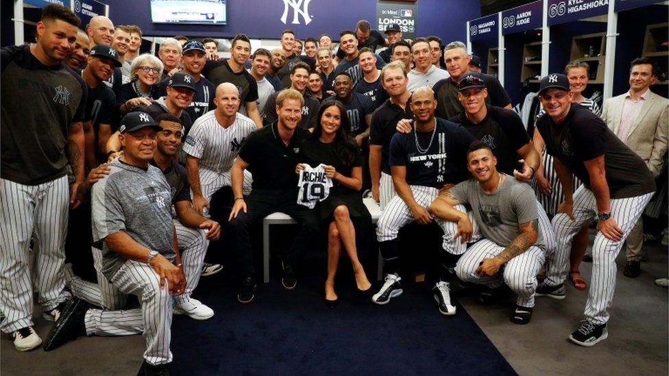 The royal couple pose with the New York Yankees ahead of the game