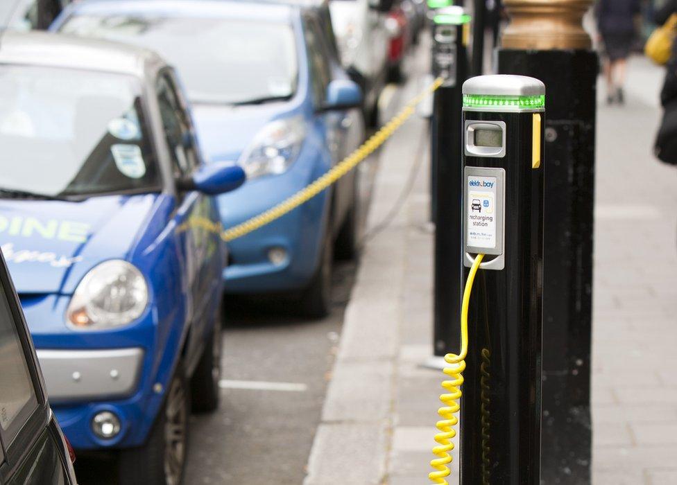 electric cars at charging stations