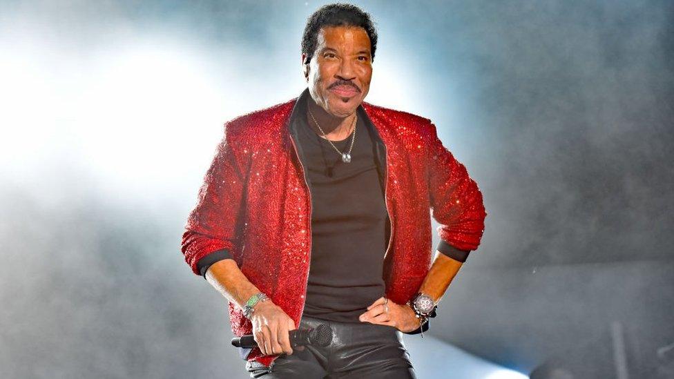 Lionel Richie performing on stage