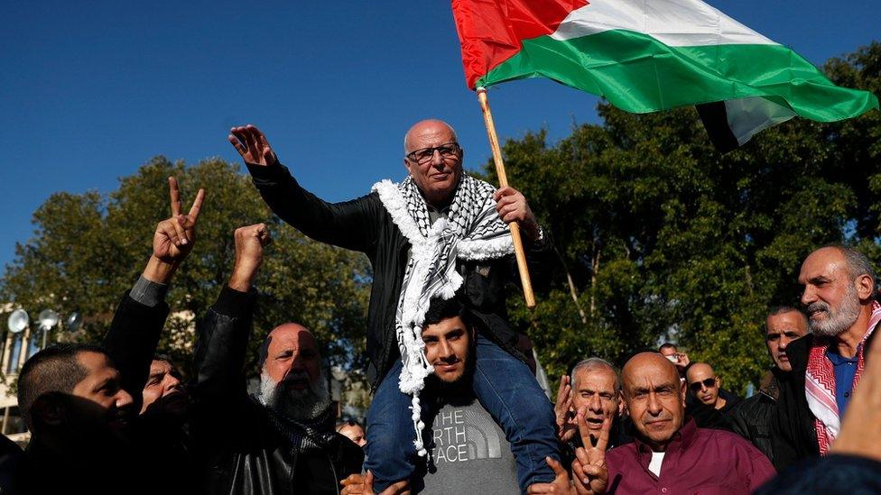 Karim Younis is greeted by family and friends in his home village of Ara, in northern Israel, following his release from prison on 5 January 2023