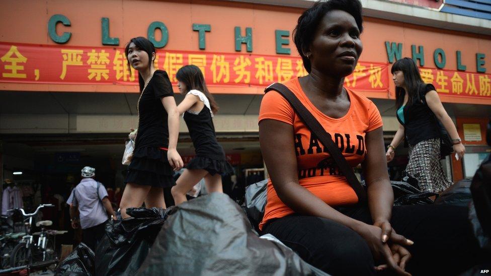 A Zambian vendor outside a wholesale store in China