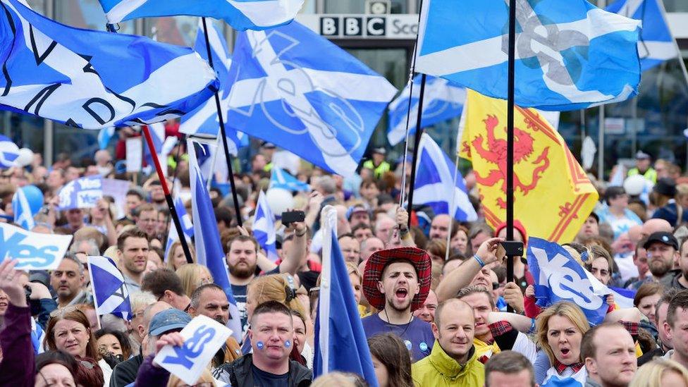 Pro-independence supporters march through Glasgow.