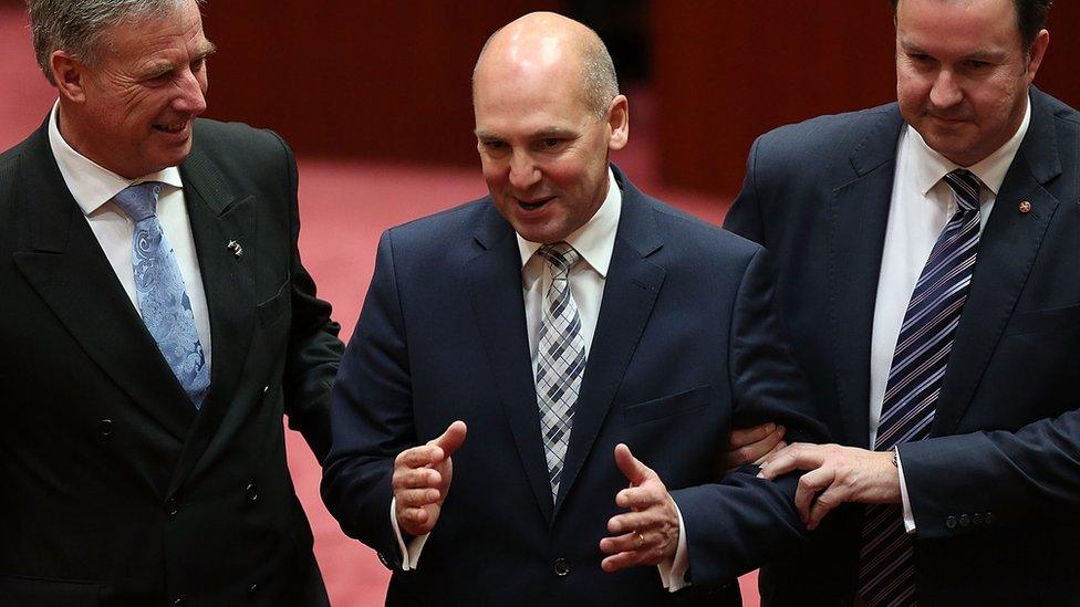 Stephen Parry (centre) being elected president of the Senate in 2014